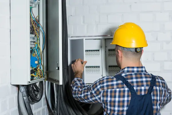 3 male-electrician-repairing-circuit-line-2022-12-16-18-54-34-utc